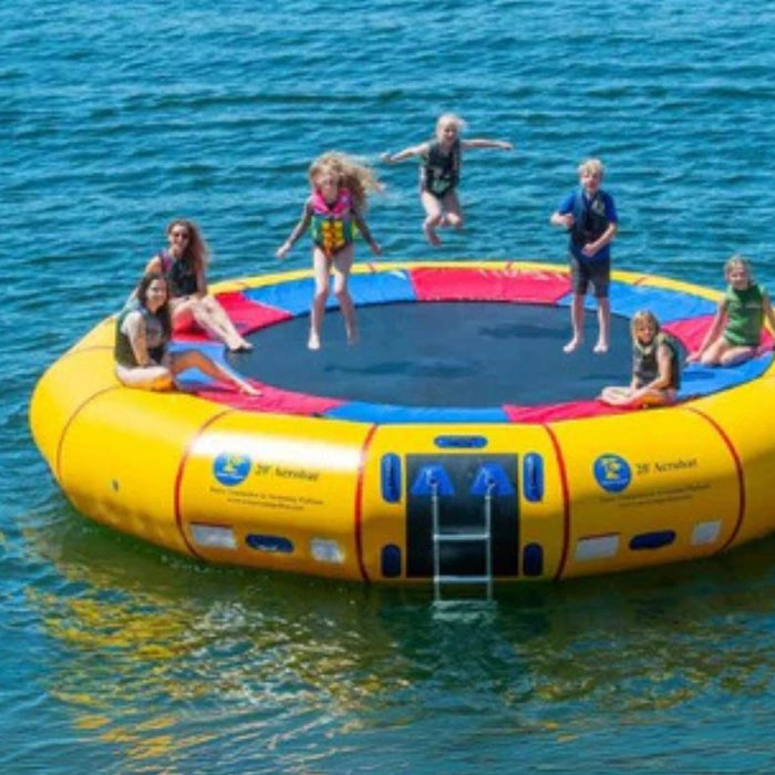7 kids on a water trampoline jumping around - Water Trampoline vs Water Bouncer