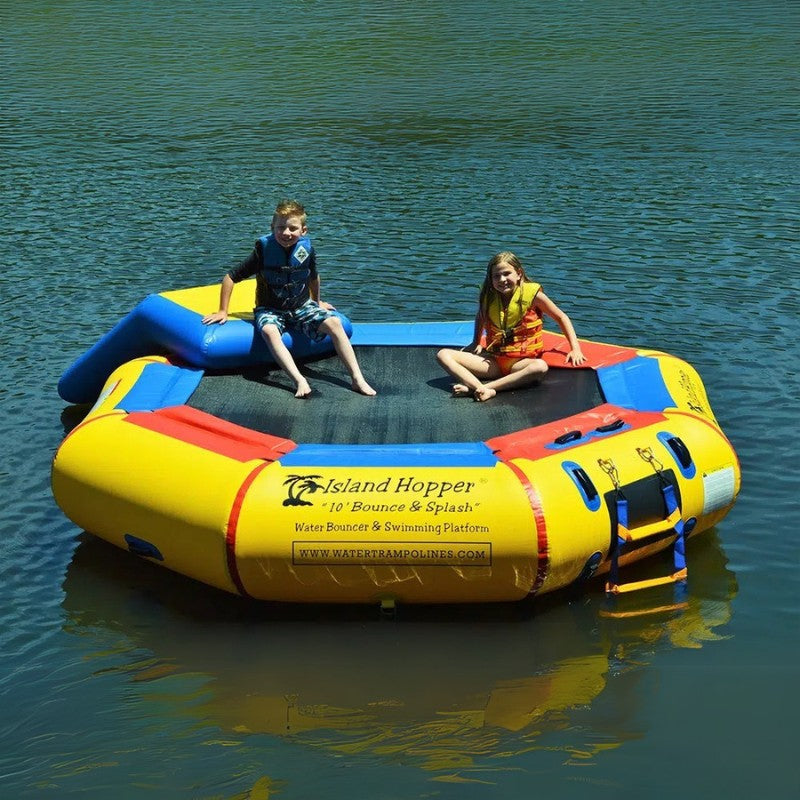 Island Hopper 10' Bounce and Splash Water Park w/ Slide - Showing 2 kids having fun on the water park
