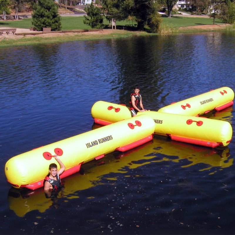Island Hopper Runner Attachment - Two teenagers riding the inflatable attachment