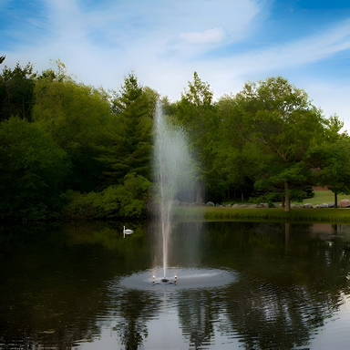 Scott Aerator Gusher Nozzle - Spray Pattern On Display With Trees at the Background