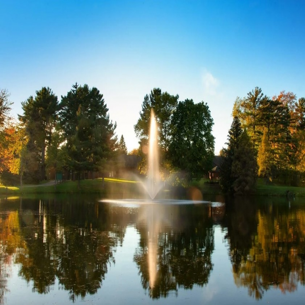 Scott Aerator Skyward Nozzle - Spray Pattern Display on a Reflective Water
