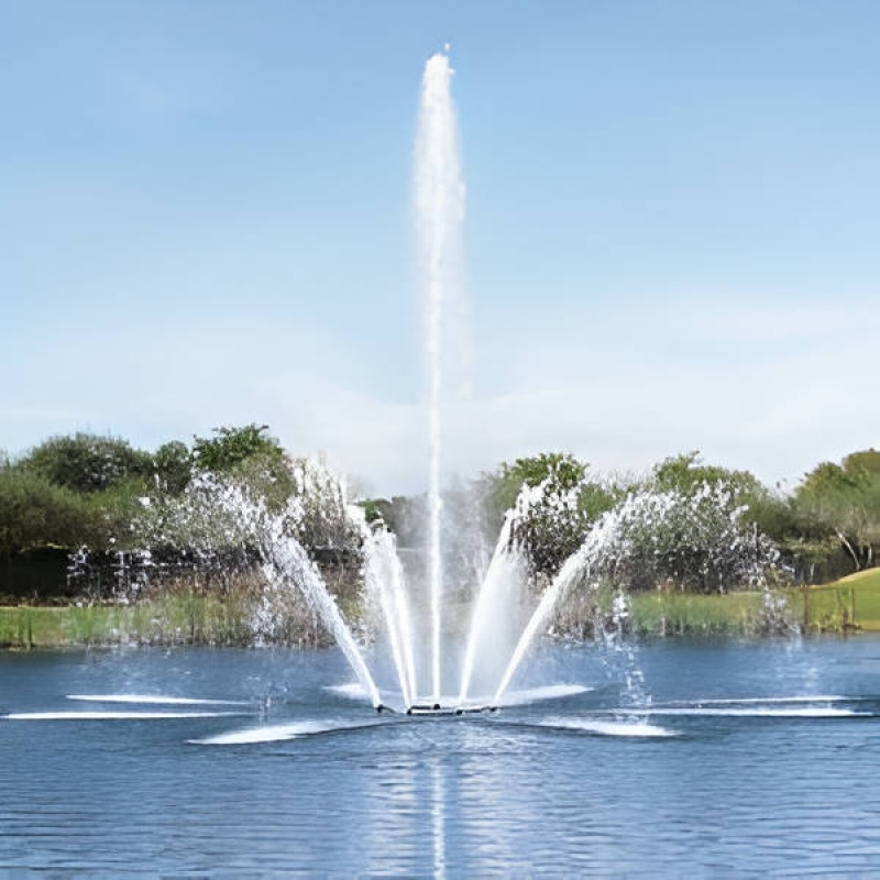 Vertex AerationJet Floating Fountain Vertex AerationJet Floating Fountain Series On Water with Trees at the Backrgound