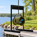 Airmax Weeds Away with stand mount positioned on a lakeside dock