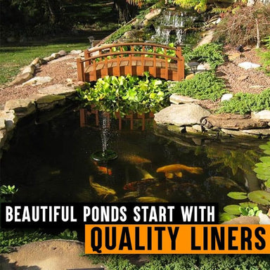 Anjon LifeGuard 60 Mil EPDM Pond Liner installed beneath a landscaped koi pond with rocks, plants and a wooden bridge