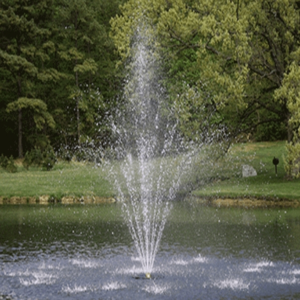 Bearon Aquatics Aphrodite Nozzle Spray Pattern On Water with Trees at the Background