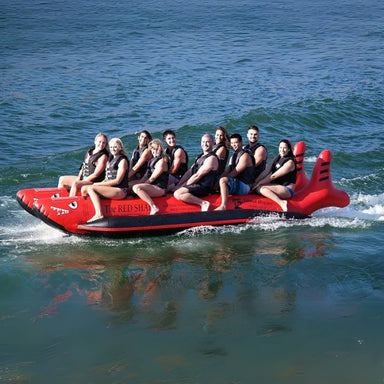 Island Hopper 10 Person Red Shark Banana Boat - Showing the group of friends enjoying the ride on the banana boat