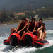 Island Hopper 10 Person Red Shark Banana Boat - Showing the group of males enjoying the ride on the banana boat