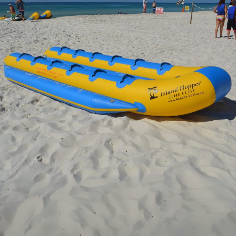 Island Hopper 12 Person Banana Taxi Banana Boat - Showing the banana taxi boat on the shore