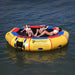 Island Hopper 13' Bounce and Splash Water Bouncer - Showing a group of girls sunbathing on the water bouncer