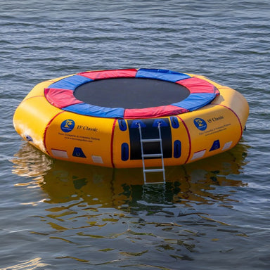 Island Hopper 15' Water Trampoline - Showing the trampoline on the water with a ladder