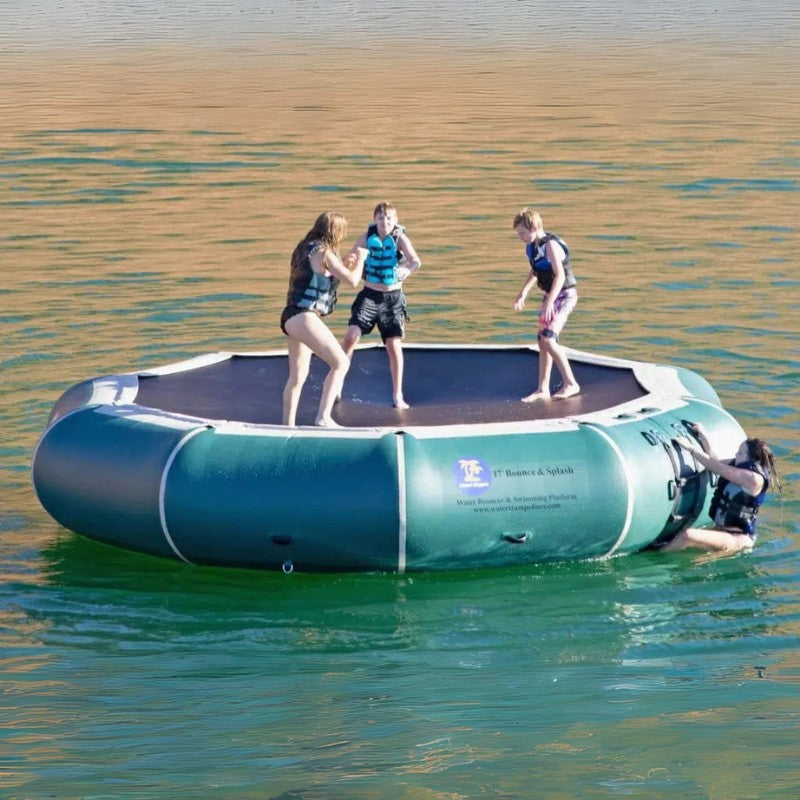 Island Hopper 17' Bounce and Splash Water Bouncer - Showing a group of kids having a great time playing on the water bouncer
