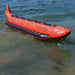 Island Hopper 6 Person Red Shark Banana Boat - Showing the banana boat near the shore