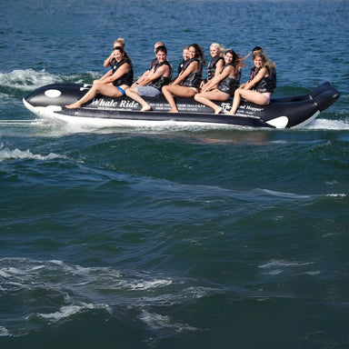 Island Hopper Elite Class 10 Person Whale Ride Banana Boat - Showing a group of friends enjoying the ride on the banana boat