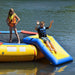 Island Hopper Water Bouncer Slide Attachment - Showing two kids enjoying the slide attached to the water bouncer