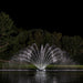 Kasco Fern Fountain white lighting display on pond at night