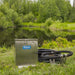 Kasco Home Series Diffused Aeration System - unit on grass with a lake and trees in the background