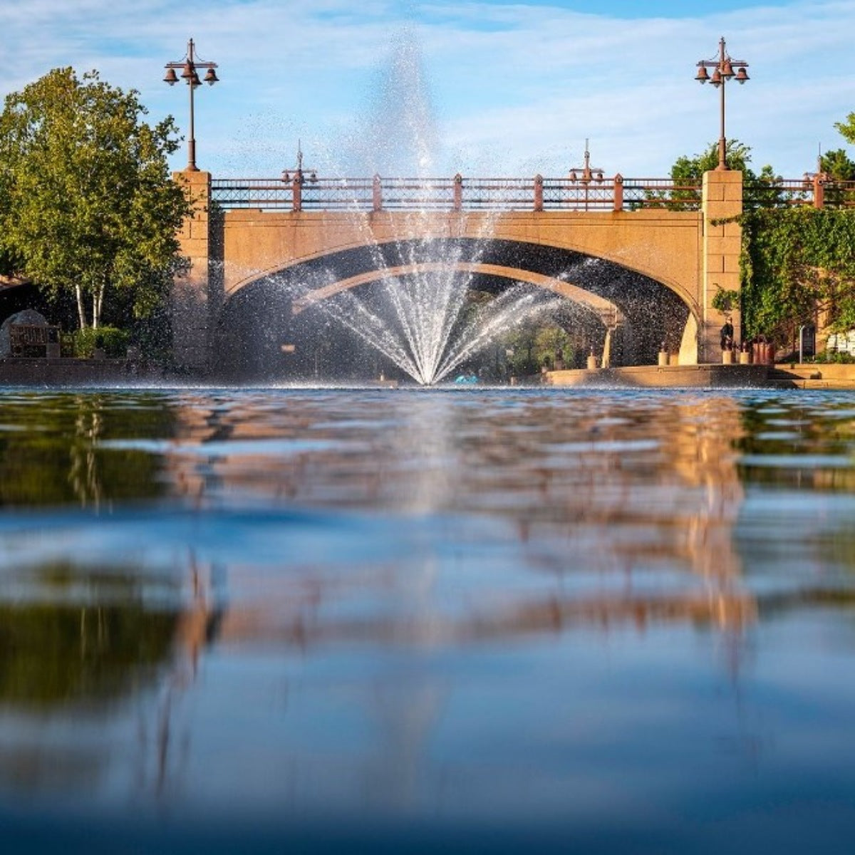 Kasco J Series Fountain Masterpiece Bundle - On Water Display with a Bridge in the Background