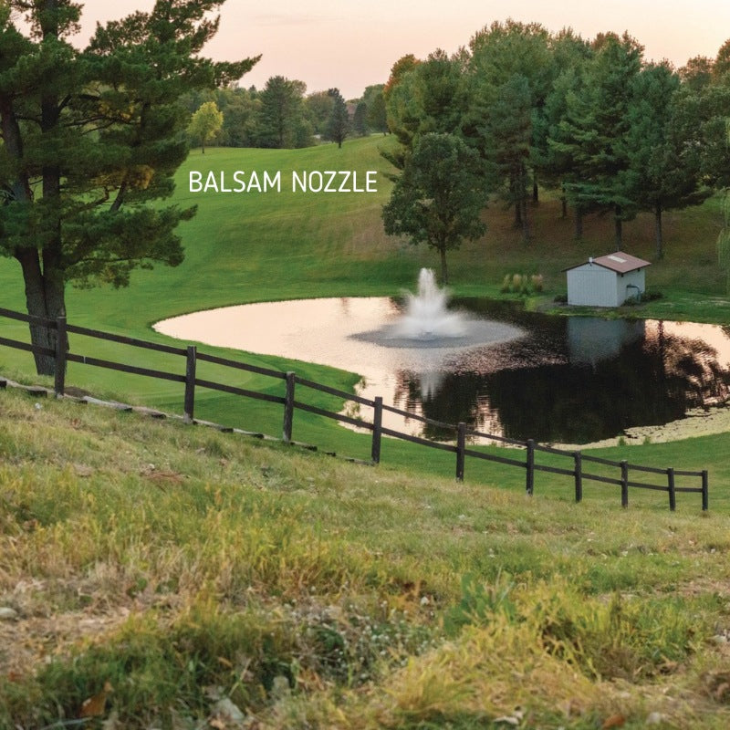 Kasco J Series Fountain featuring the Balsam nozzle spray pattern in a golf course pond surrounded by rolling green landscape