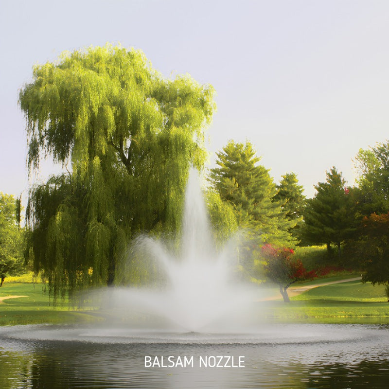 Kasco J Series Fountain with Balsam nozzle spray pattern producing a wide lower arc and tall center plume in a scenic pond