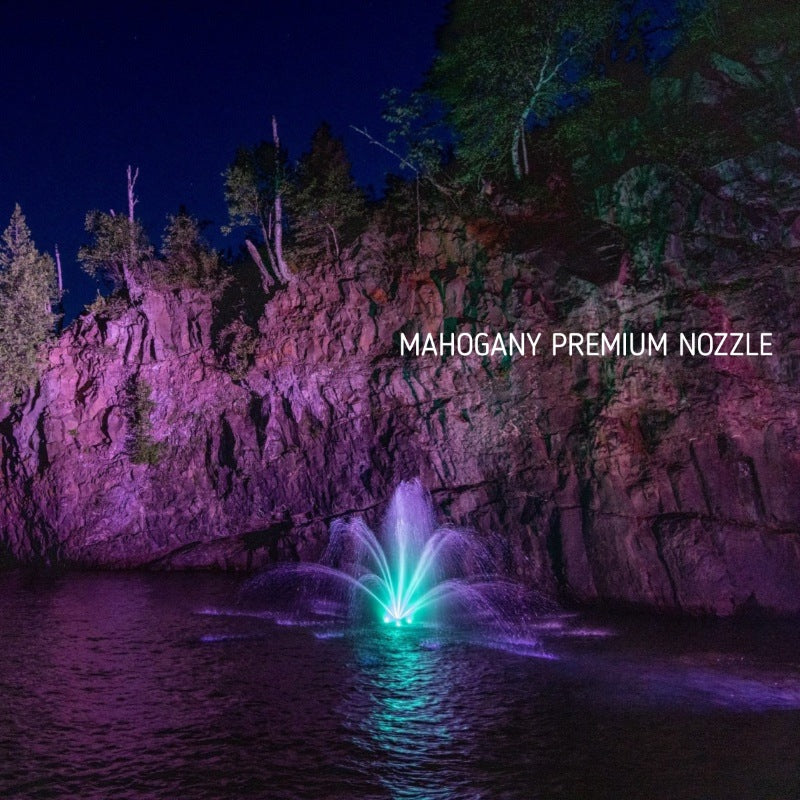 Kasco J Series Fountain with Mahogany Premium nozzle illuminated at night