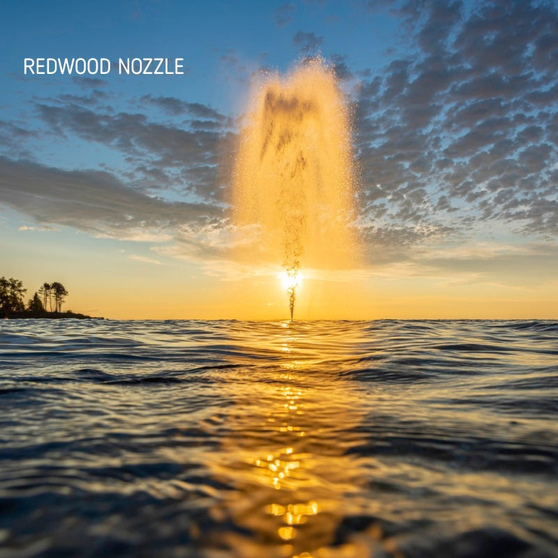 Kasco J Series Fountain with Redwood Nozzle spray pattern at sunrise on open lake low-angle view