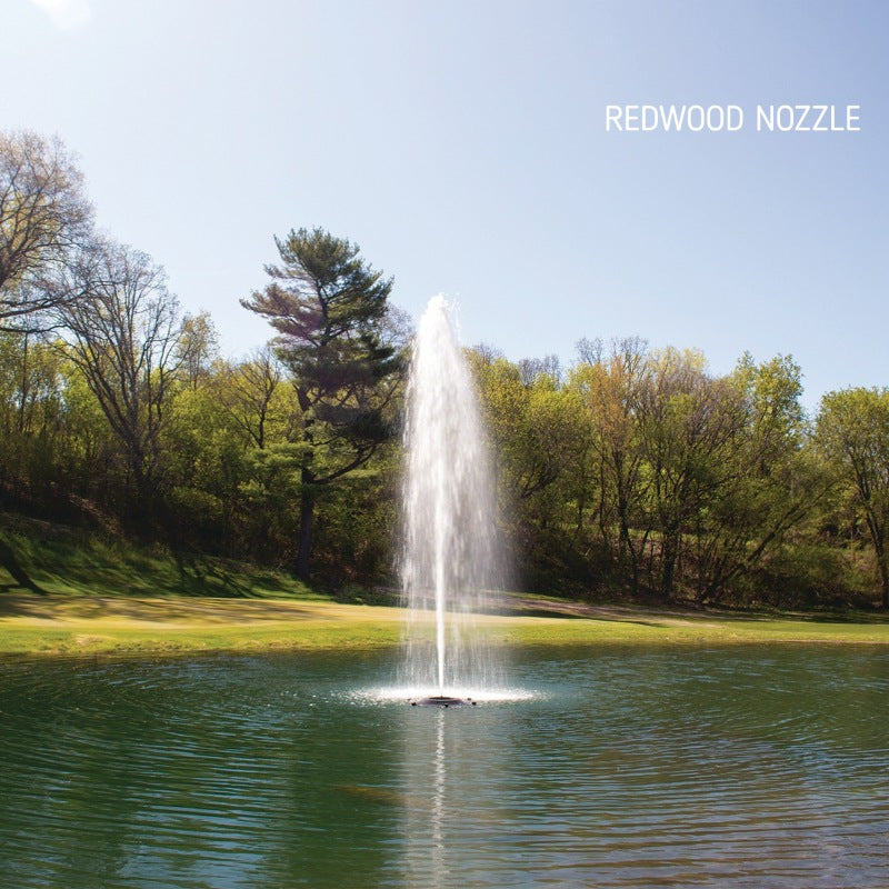 Kasco J Series Fountain with Redwood Nozzle spray pattern in daytime spring pond setting
