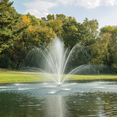 Kasco Mahogany Fountain spray pattern in daytime autumn golf course pond setting