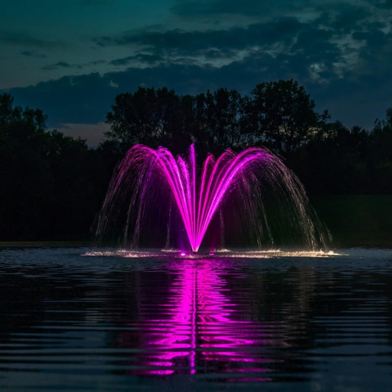 Kasco Palm Premium Fountain Nozzle with pink LED lighting in nighttime pond