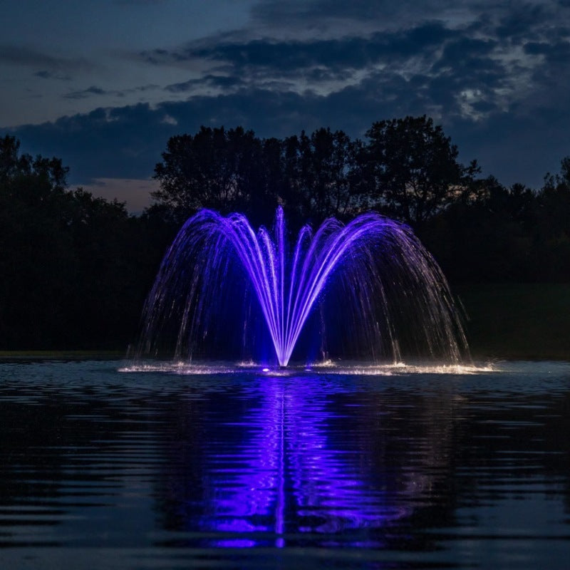 Kasco Palm Premium Fountain Nozzle with purple LED lighting illuminating spray pattern