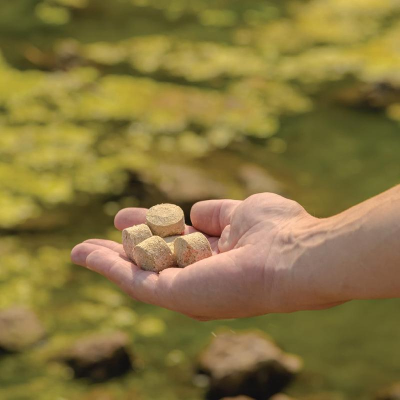 Kasco Pond Probiotics - Muck Pucks in hand