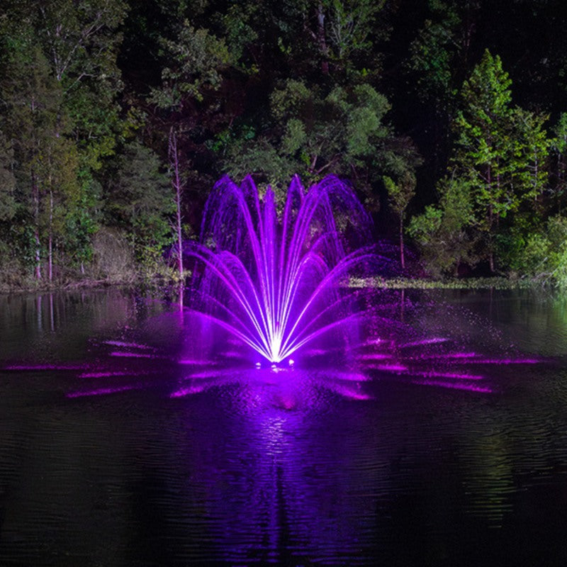 Kasco RGBW LED Lighting - RGBW18 LED Lighting System illuminating a fountain in vibrant purple at night