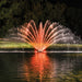Kasco RGBW LED Lighting - RGBW18 LED Lighting System illuminating a fountain with orange and white lighting effects