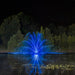 Kasco RGBW LED Lighting - RGBW18 LED Lighting System illuminating a wide-pattern fountain in blue at night