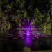 Kasco RGBW LED Lighting - RGBW18 LED Lighting System illuminating a wide-pattern fountain in purple at night