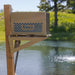 Kasco Robust-Aire Diffused Aeration System - Small Cabinet with Post Mount Bracket on a wooden stand by a pond
