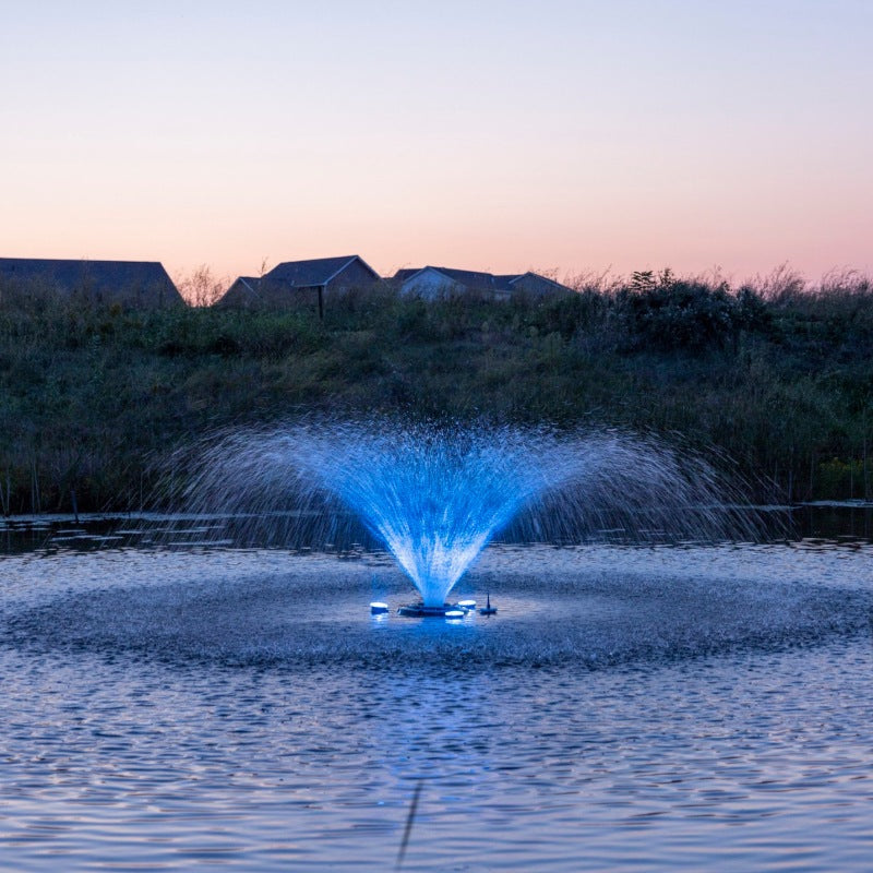 Kasco VFX aerating fountain with blue LED lighting reflecting on water