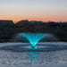 Kasco VFX aerating fountain with teal LED lighting highlighting spray pattern