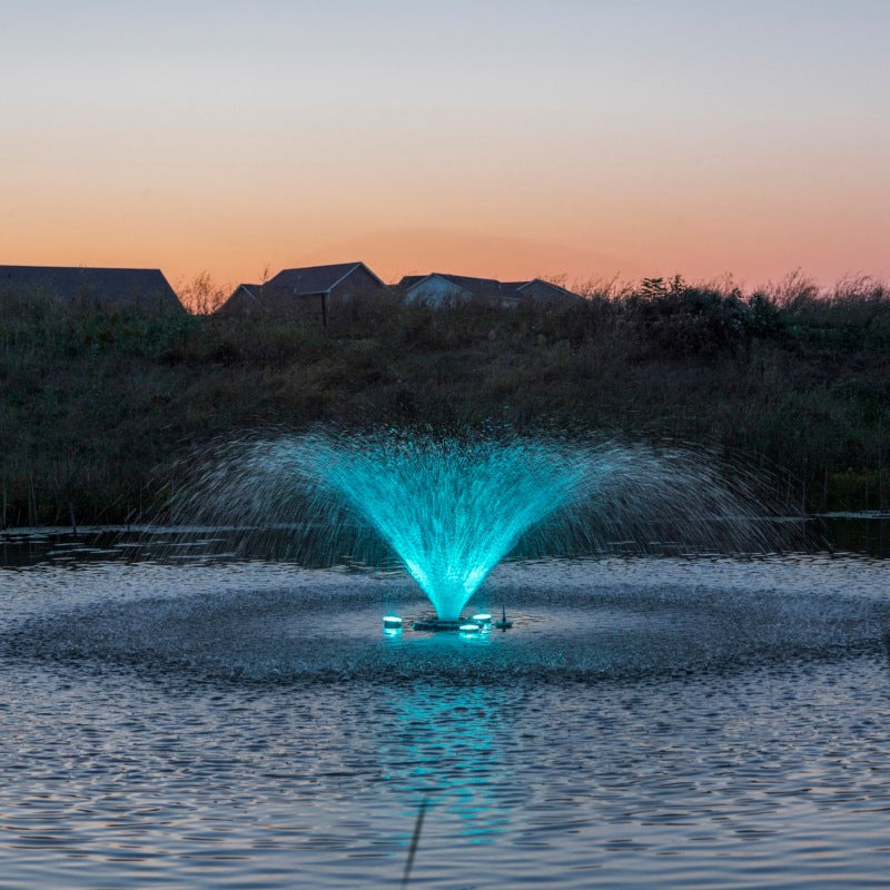 Kasco VFX aerating fountain with teal LED lighting highlighting spray pattern