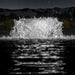 Kasco surface aerator with bright white LED lighting in pond at night
