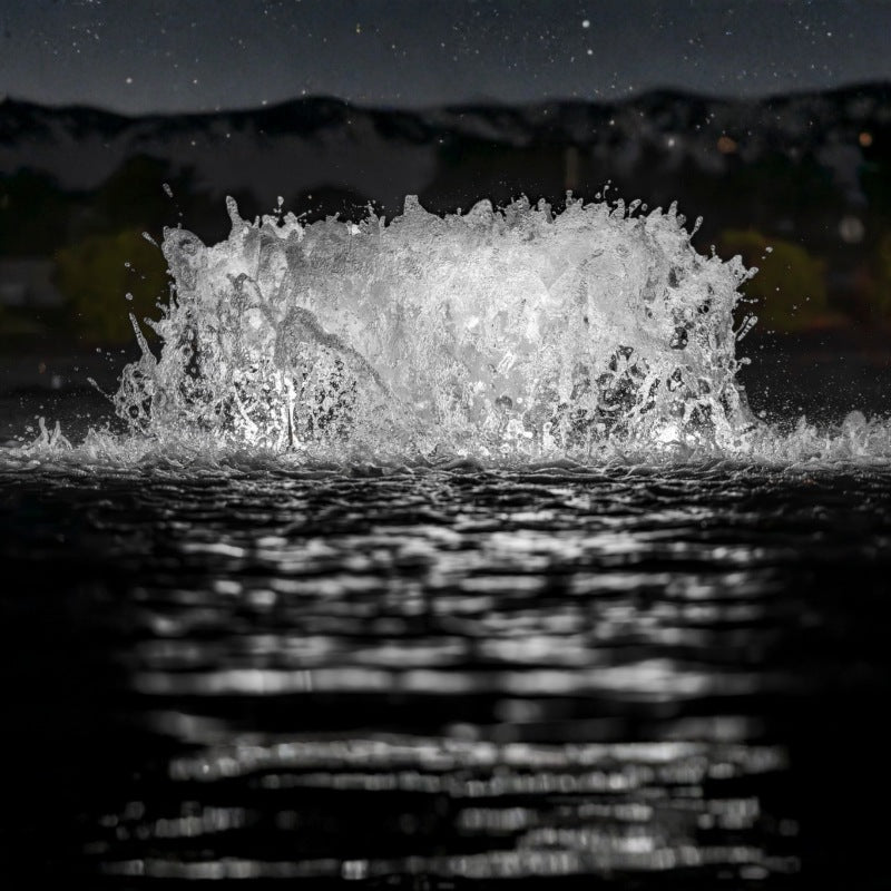 Kasco surface aerator with bright white LED lighting in pond at night