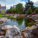 Landscaped backyard swimming pond created with the Aquascape Recreational Pond Kit