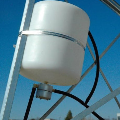 Outdoor Water Solutions Freeze Control Unit Close up View of the Tank with Blue Backgroud