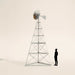 Outdoor Water Solutions Super Premier Windmill Pond Aerator tower shown with human silhouette for size comparison