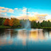 Scott Aerator Atriarch Fountain Masterpiece Bundle - On Blue Water with Trees in the Background