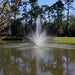 Scott Aerator Cambridge Pond Fountain - On Water Display with Trees and Grass at the Background