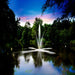 Scott Aerator Clover Fountain Masterpiece Bundle - Clover Fountain on Water Display, Showcasing Its Spray Pattern at Dusk