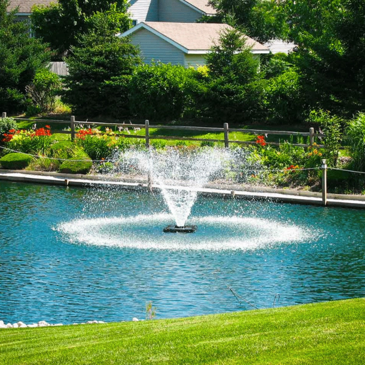 Scott Aerator DA-20 Aerating Fountain Masterpiece Bundle  - DA-20 - On a Blue Water with Houses at the Background
