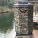 Texas Avenger Fish Feeder - A close up look of the fish feeder beside the pond