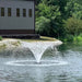 Vanguard Typhoon 3/4 HP Floating Display Aerator On Water Display w/ House at the Background