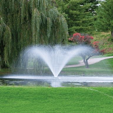 Kasco VFX Series Fountain - On Water with Green Trees and Grass at the Background